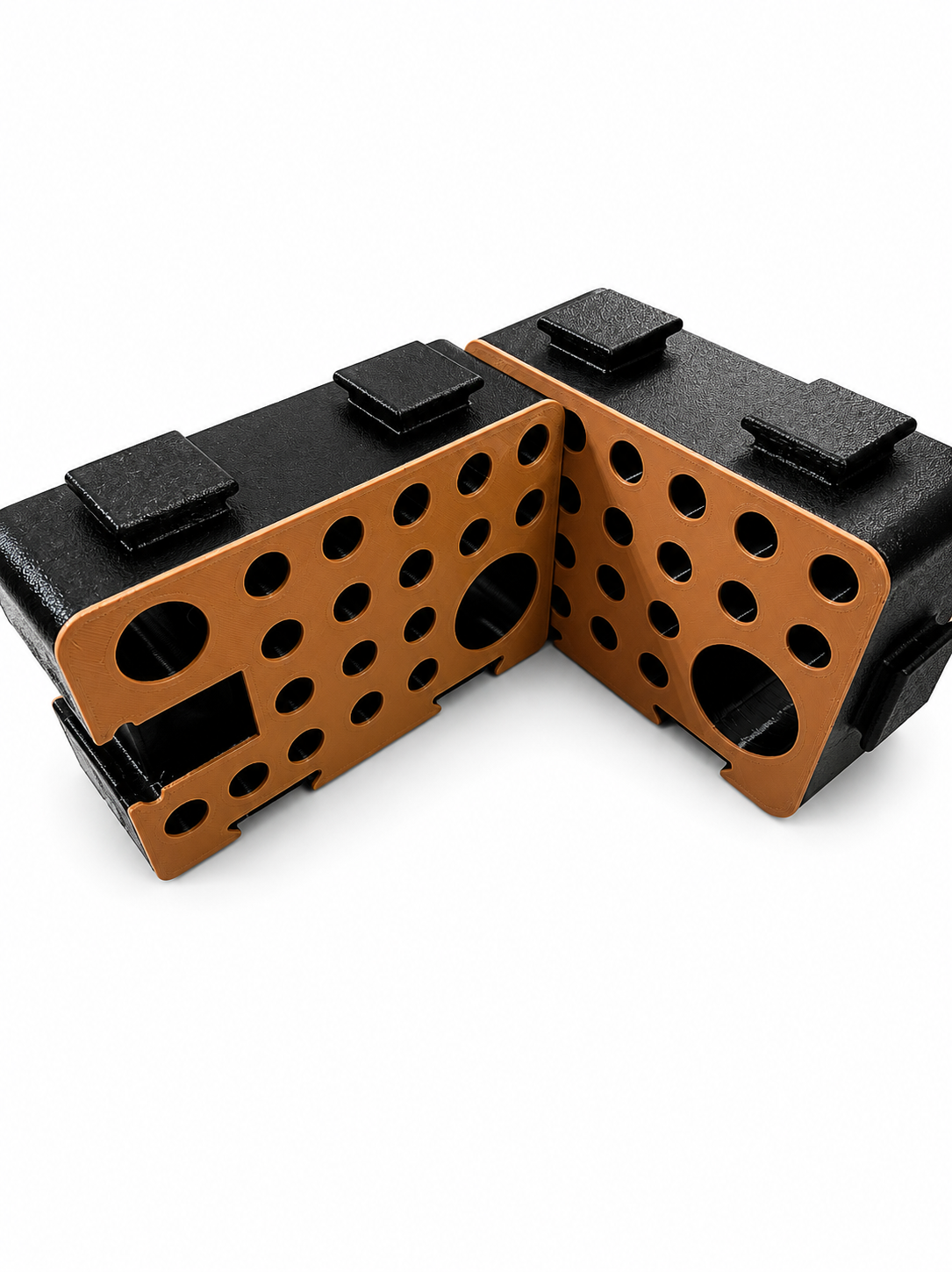 Two orange and black D-Blocks joined at a right angle to form a corner configuration